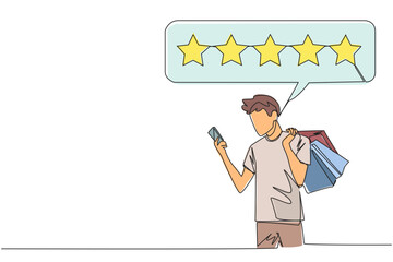 Single continuous line drawing happy smiling man holding several shopping bags. The other hand typing on the smartphone gives a 5 star review. Online shopping. One line design vector illustration