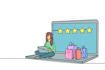 Single continuous line drawing happy woman sitting on giant laptop typing on laptop computer. Bought a lot from online shop. Give a rating of 5 stars. Ecommerce. One line design vector illustration