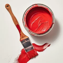 Deurstickers Top view of open red paint can with stir stick and paintbrush with red stroke on white surface. © cherezoff