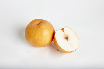Pear, cut pear slices and fresh fruit on white background