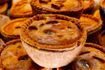 Fresh baked stuffed meat pies, Britisch pastries, snacks
