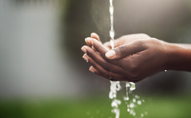 Hands, water splash and sustainability with hygiene for environment, health and eco friendly on...