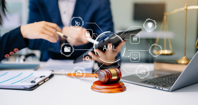 AML Anti Money Laundering Financial Bank Business Concept. judge in a courtroom using laptop and tablet with AML anti money laundering icon .