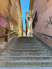 a street with stairs in the old town of Warsaw - 785988295