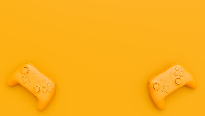 Video game joysticks or gamepads in plain monochrome yellow color background © Vasyl Onyskiv