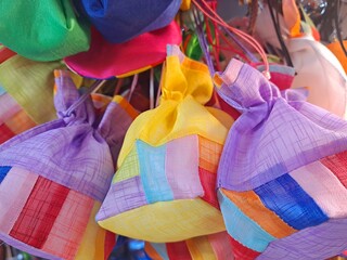 Traditional Korean handmade lucky bag in various colors - Koreans give a fortune pouch with cash to family, relatives and friends wishing them another happy and healthy New Year