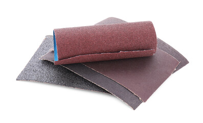 Many sheets of sandpaper isolated on white