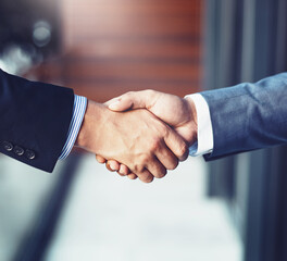 Handshake, deal and business men in office with b2b partnership, collaboration or agreement. Thank...