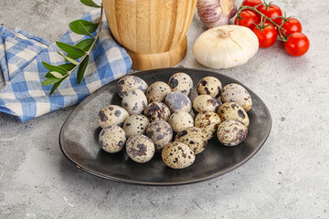 Raw quail eggs in the bowl