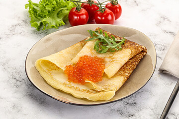 Russian pancake with red caviar