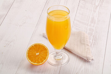 Sweet fresh orange juice in the glass