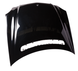 Black iron hood on an isolated background in a photo studio separately after staining and straightening. Bonnet in a car service for sale.