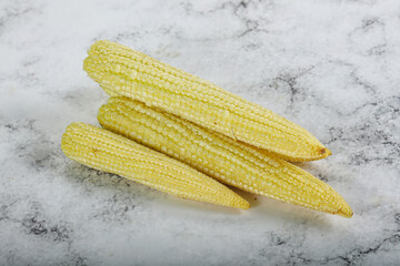 Raw sweet baby corn heap