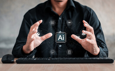 Chat with AI or Artificial Intelligence. Young businessman chatting with a smart AI or artificial intelligence using an artificial intelligence chatbot developed by OpenAI.