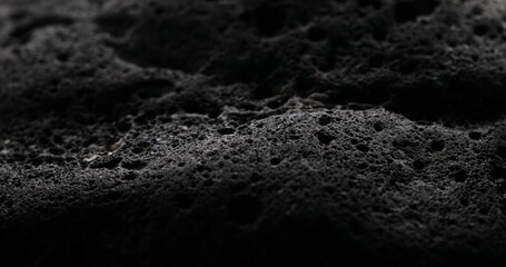 Porous Stone Texture Resembling a Lunar Landscape. Close-up, shallow dof.