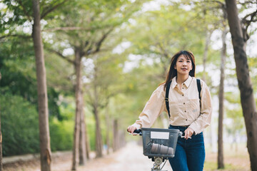 Asian woman renting shared bicycle in city