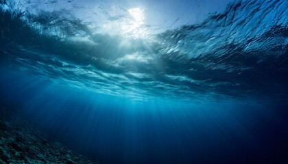Fototapeta na wymiar Dark blue ocean surface seen from underwater 