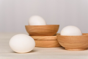Fresh white organic eggs of the Leghorn breed from local farms raised in an open system. Ingredients for cooking healthy food