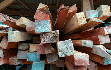 Selective focus. A stack of unused lumber, a building material. Indonesia.
