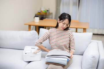 Housewife suffer from back pain with doing housework at home
