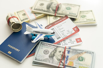 white plane on dollar cash closeup