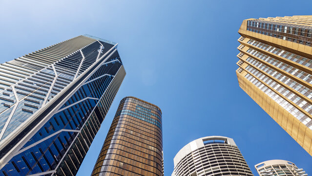 Highrise modern architecture in Sydney, New South Wales, Australia. Blue sky background with space for text.