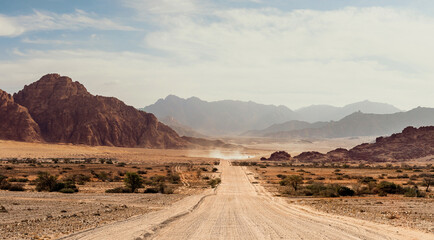 Empty Road safari and travel to Africa extreme adventures or science expedition in a stone desert....