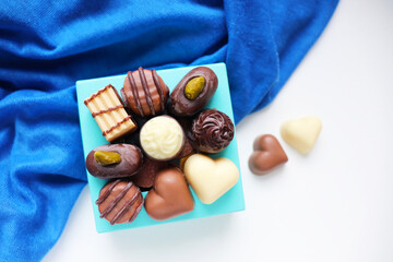 set of chocolates in a gift box on a white background
