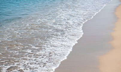 Soft wave of blue sea on sandy beach. - 786069462