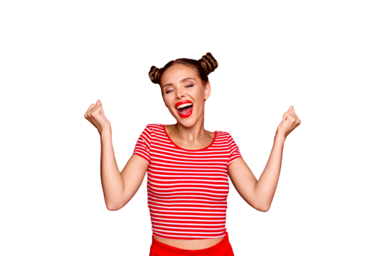 Portrait of cheerful girl with toothy smile raised hands and showing successful celebrate goal isolated on red background