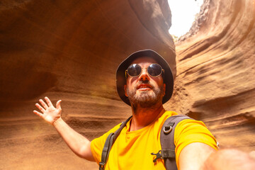 Selfie of a tourist enjoying in the limestone canyon Barranco de las Vacas in Gran Canaria, Canary...