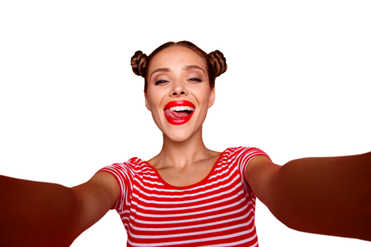 Self portrait of happy pretty positive girl shooting selfie on front camera with two hands having video-call with friend isolated on red background. Joy fun concept