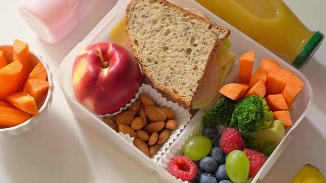 Back to school concept - school lunch with colorful pensils on white background