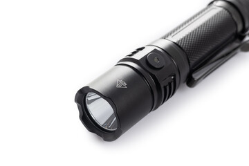 black rechargeable electric LED flashlight isolated on white background