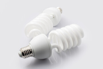 two fluorescent light bulb on white background