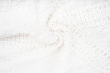 White background with lace flower. Texture background.