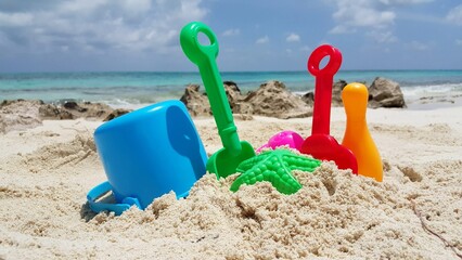 Fototapeta na wymiar Toys on a tropical beach sand in Maldives