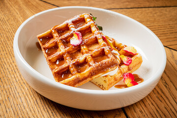 belgian waffle with vanilla sauce