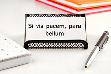 Si vis pacem, para bellum. Latin phrase meaning If you want peace, prepare for the war. on a white...