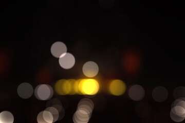 Blurred image of yellow street lights at night