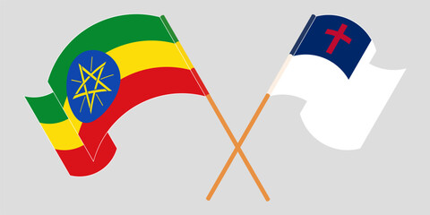 Crossed and waving flags of Ethiopia and christianity