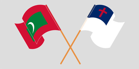 Crossed and waving flags of Maldives and christianity