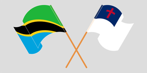 Crossed and waving flags of Tanzania and christianity
