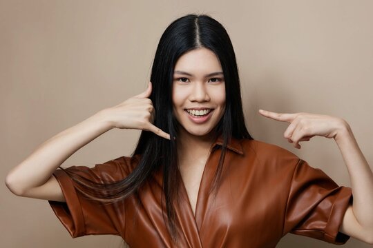 Asian woman glamour salon portrait beauty model fashion beautiful beige cosmetic femininity hair