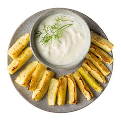 Oven baked zucchini wedges served with greek yogurt. Vegetable chips on gray plate isolated on white  background. Vegetarian food concept. Top view.
