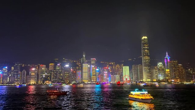 Victoria Habour, Hong Kong - Apir 14th 2024 - VDO of Bustling harbour area with waterfront scenery and popular nighttime light.