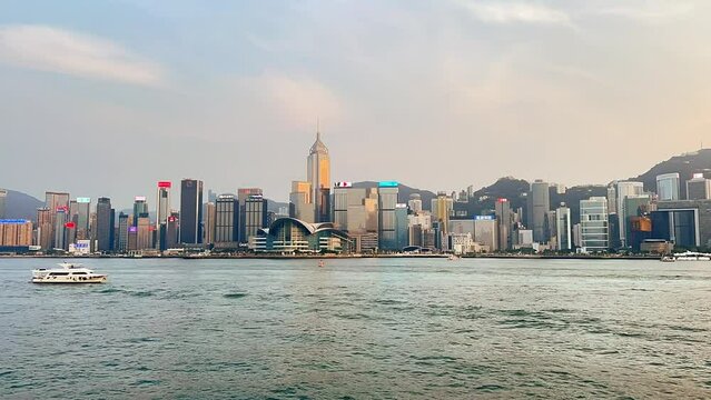 Victoria Habour, Hong Kong - Apir 14th 2024 - VDO of Bustling harbour area with waterfront scenery and popular nighttime light.