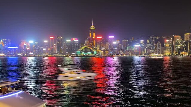 Victoria Habour, Hong Kong - Apir 14th 2024 - VDO of Bustling harbour area with waterfront scenery and popular nighttime light.