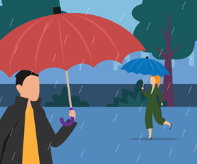Man and woman with umbrella in the rain