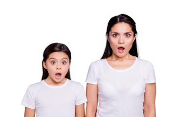 Close up photo pretty two people brown haired mum small little daughter eyes mouth opened frightened oh no facial expression wearing white t-shirts isolated bright blue background